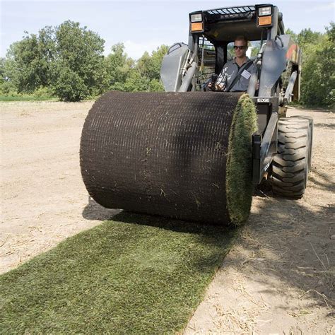 skid steer attachment to unroll plastic|CEAttachments .